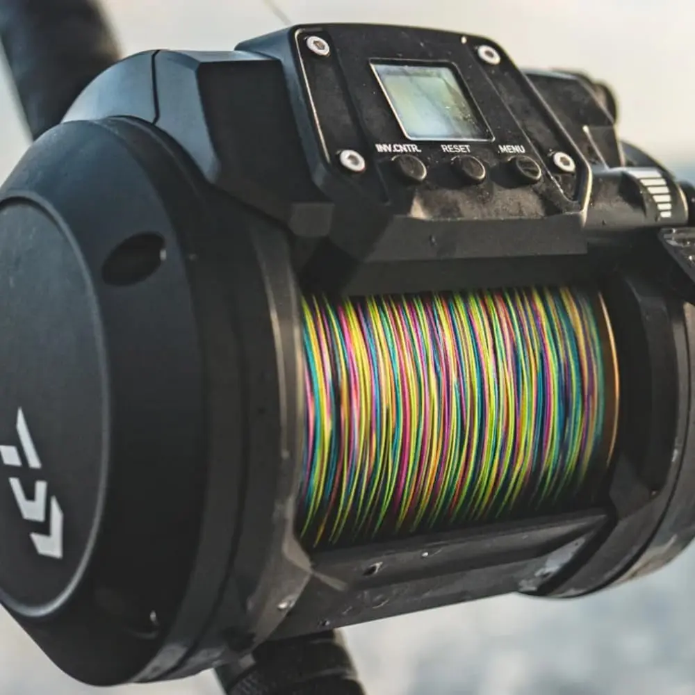 Black Daiwa TANACOM1000 Dendoh - مراجعة Fly Reel وسعره